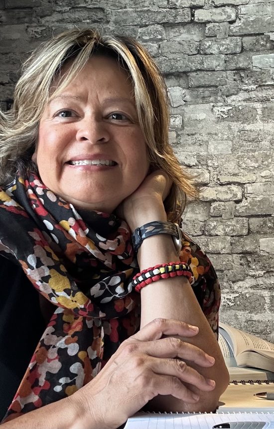 Andrea author pic black shirt scarf 2024 Andrea author pic black shirt scarf 2024